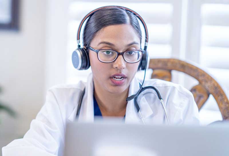 A photo of a health care professional during a virtual appointment