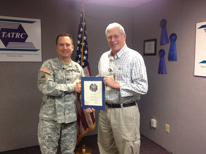 Photo of COL Dan Kral (left) and Mr. Rick Wise (right)
