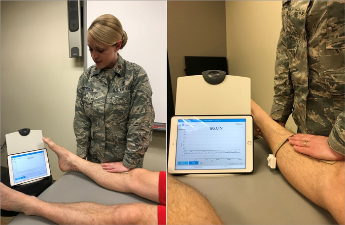 Major Danielle Anderson is demonstrating a knee extension mobilization on a training partner. The loadpad® provides an unobtrusive interface that allows the treating physical therapist to feel the joint movement while providing real time feedback via a tablet device. 