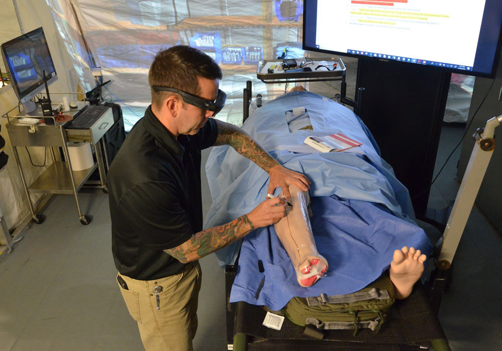 SFC Perry to place 1 fingerbreadth above the fibula during a “dry run” of the Telestration Test & Demonstration. 