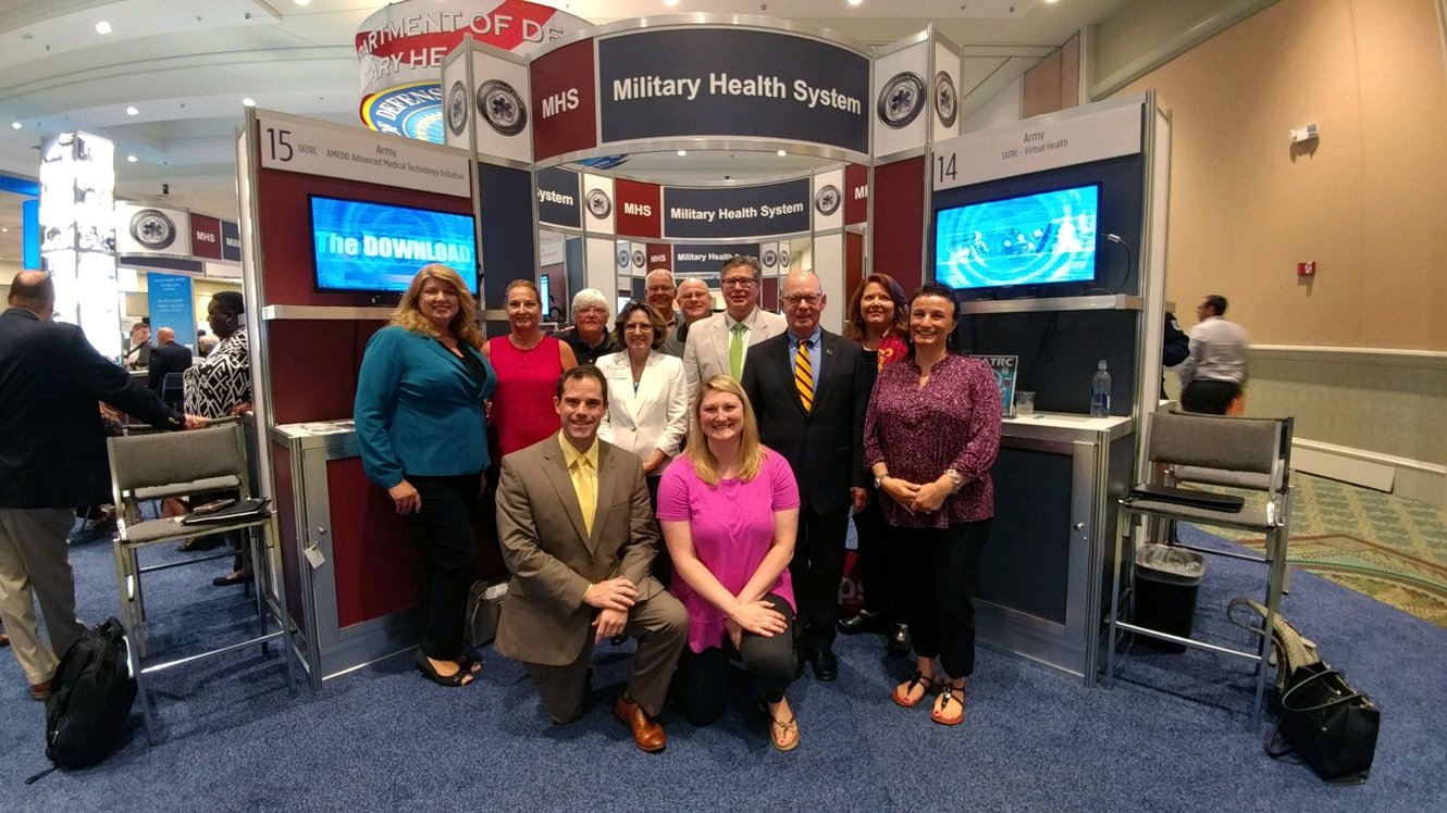 Team TATRC at DHITS 2018 in the MHS booth. 