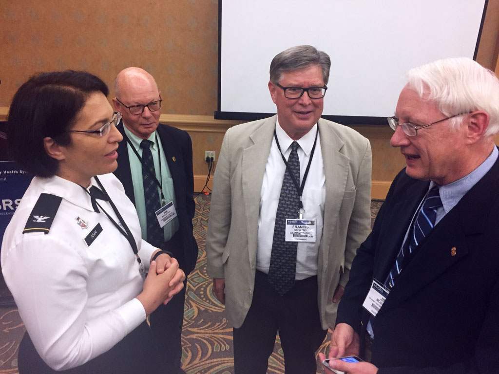 TATRC’s new Director, COL Gina Adam (left) was introduced to research partners and key stakeholders within the MHS during the event.