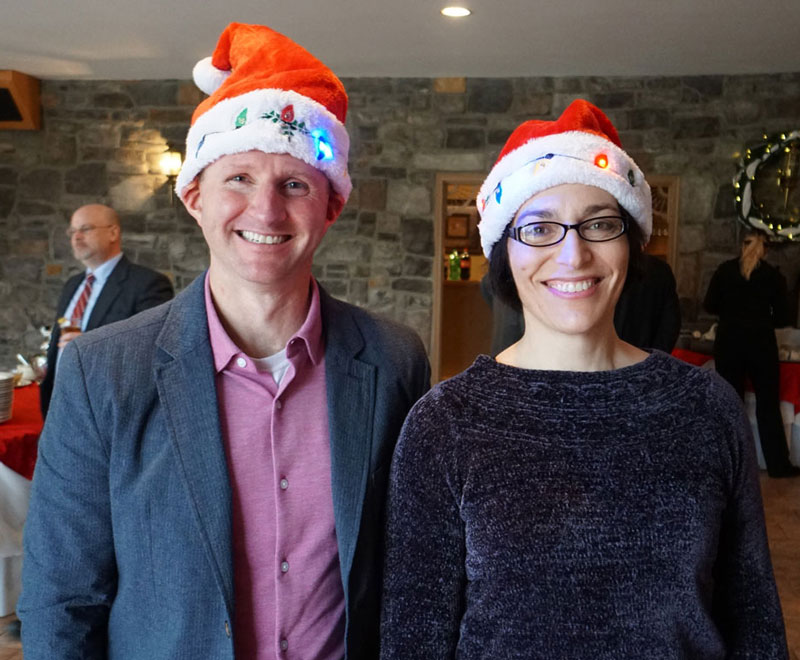 LTC (P) Pamplin (left) and COL Adam (right) showed their Holiday Spirit at TATRC’s 23rd Holiday Party.