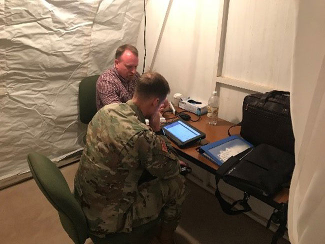 Figure 3: TATRC’s James Beach receives feedback from an ADVISOR provider.