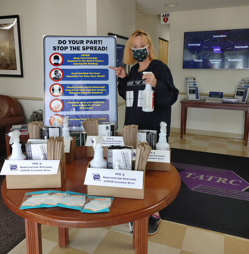 Ms. Tanya Rexrode hard at work creating “COVID cleaning kits” for our buildings