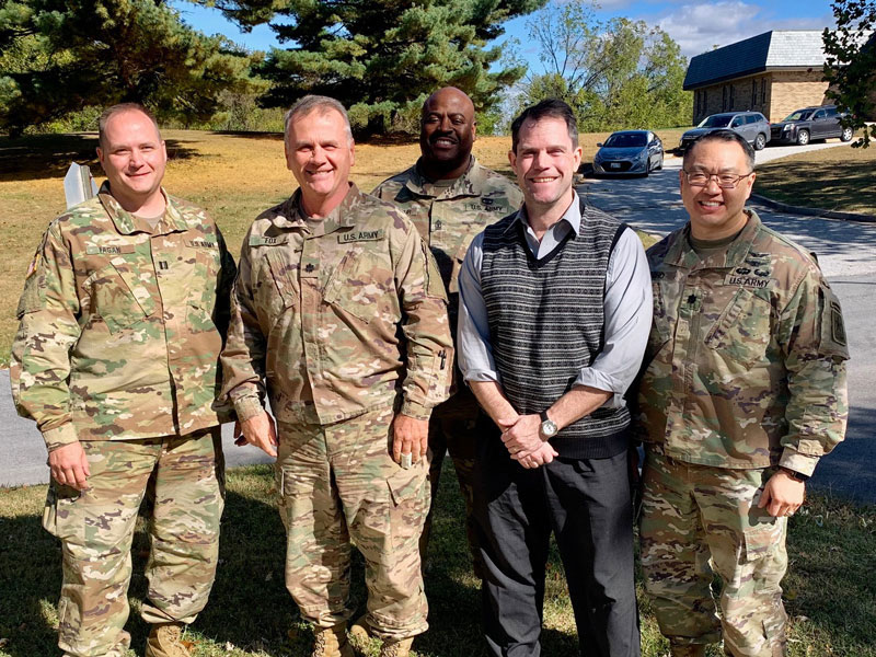 TATRC mHIC Deputy, Ron Yeaw, pictured with LTC Tim Cho, Chief of Preventive Medicine, ARNG on the right and MD-ARNG Deputy State Surgeon, LTC Bill Fox on the left, among others, at a PR2ME kick off with the Maryland National Guard Medical Office.