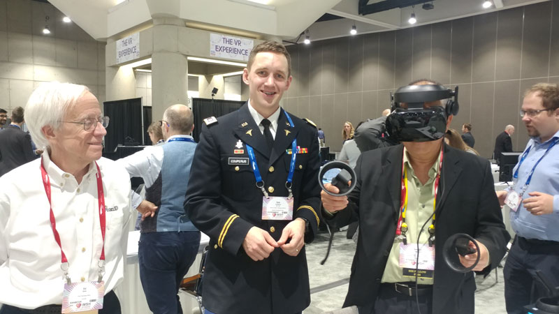 CPT Kyle Couperus (center), showcased his impressive Augmented Reality / Virtual Reality project, and is one of TATRC’s Advanced Medical Technology Initiative funded innovators.