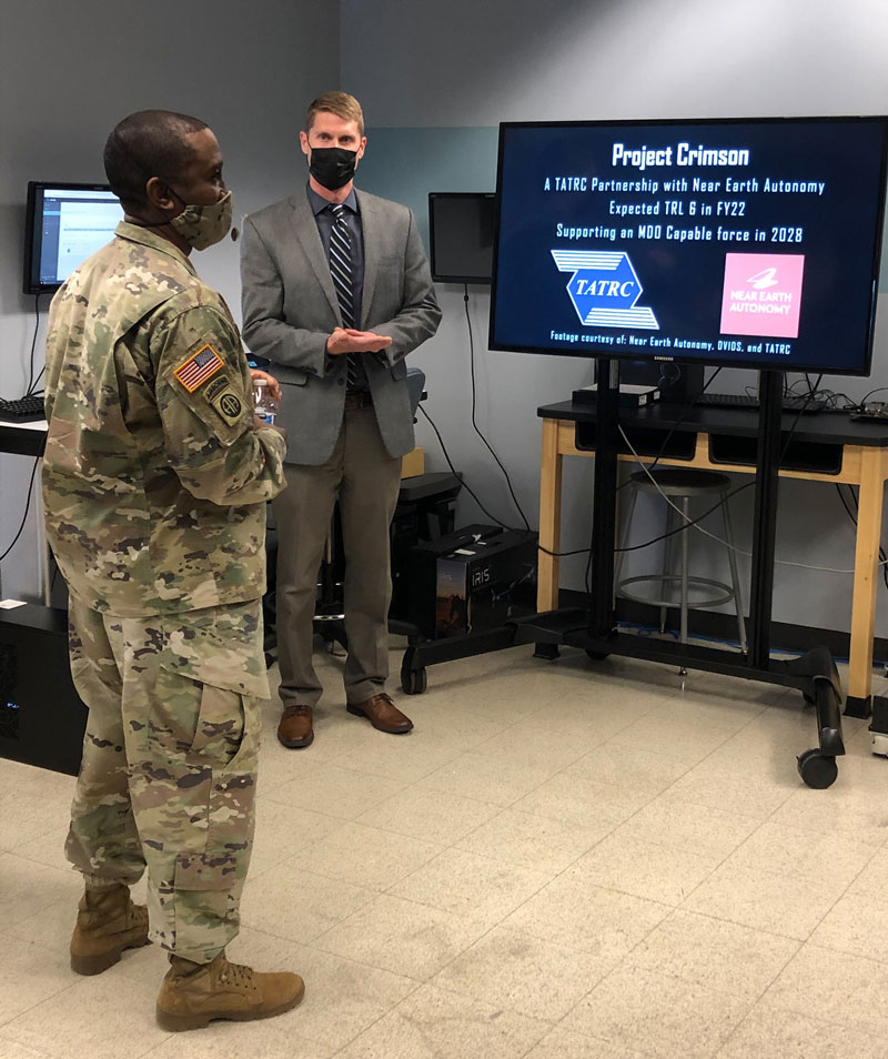 Mr. Nate Fisher, MedRAS Division Chief, was on-hand to brief CSM Hough on current TATRC initiatives.