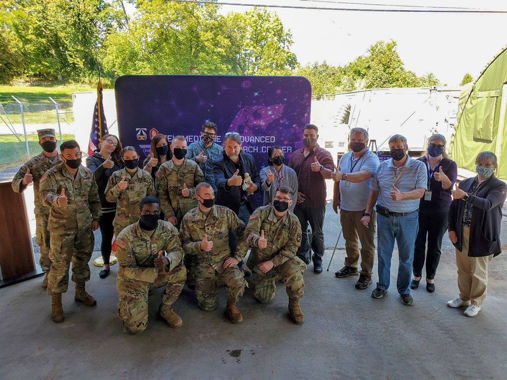 All thumbs up from USAMRDC Medics & TATRC's MMSIV Division as they wish Mr. Geoff Miller the best of luck in his newest endeavors at JHU. 