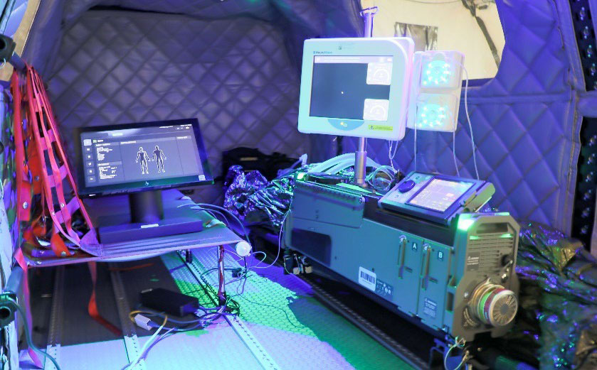 Figure 1: Proof of Concept Remote Patient Management System (RPMS). The RPMS is a medical device platform composed of mechanical ventilator, infusion pump, and patient vitals monitor devices designed to augment casualty care capability and capacity during evacuation and pre-hospital environments. 