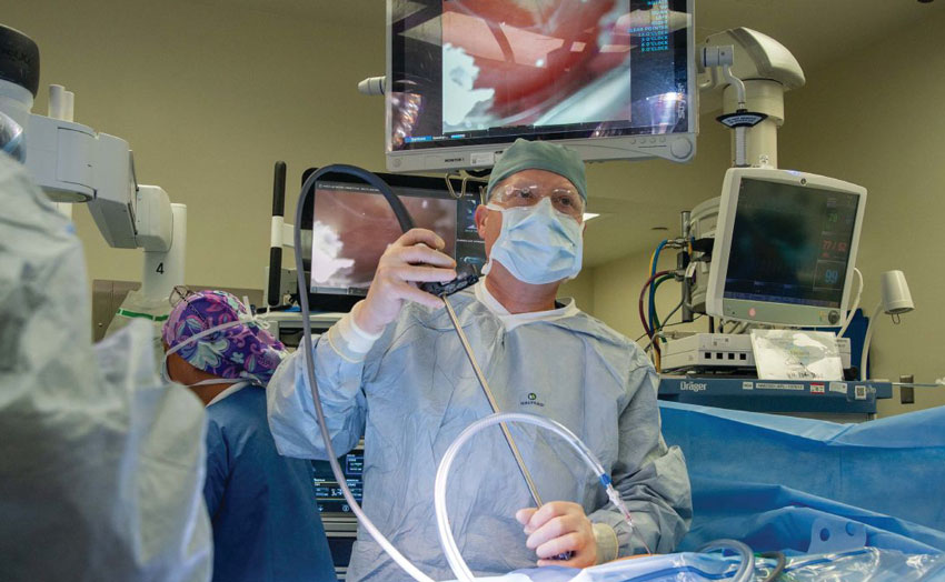 Capt. Gordon Wisbach, Navy Medicine Readiness and Training Command (NMRTC) San Diego’s Virtual Medical Operations Center (VMOC) telesurgical director, prepares for a robotic-assisted gallbladder removal surgery at NMRTC San Diego May 16. During the surgery, Wisbach communicated with Naval Hospital Camp Pendleton staff members remotely, per approved protocol, for telementoring. NMRTC San Diego’s mission is to prepare service members to deploy in support of operational forces, deliver high quality healthcare services and shape the future of military medicine through education, training and research. NMRTC San Diego employs more than 6,000 active duty military personnel, civilians and contractors in Southern California to provide patients with world-class care anytime, anywhere. (U.S. Navy photo by Mass Communication Specialist 3rd Class Mariterese Merrique)